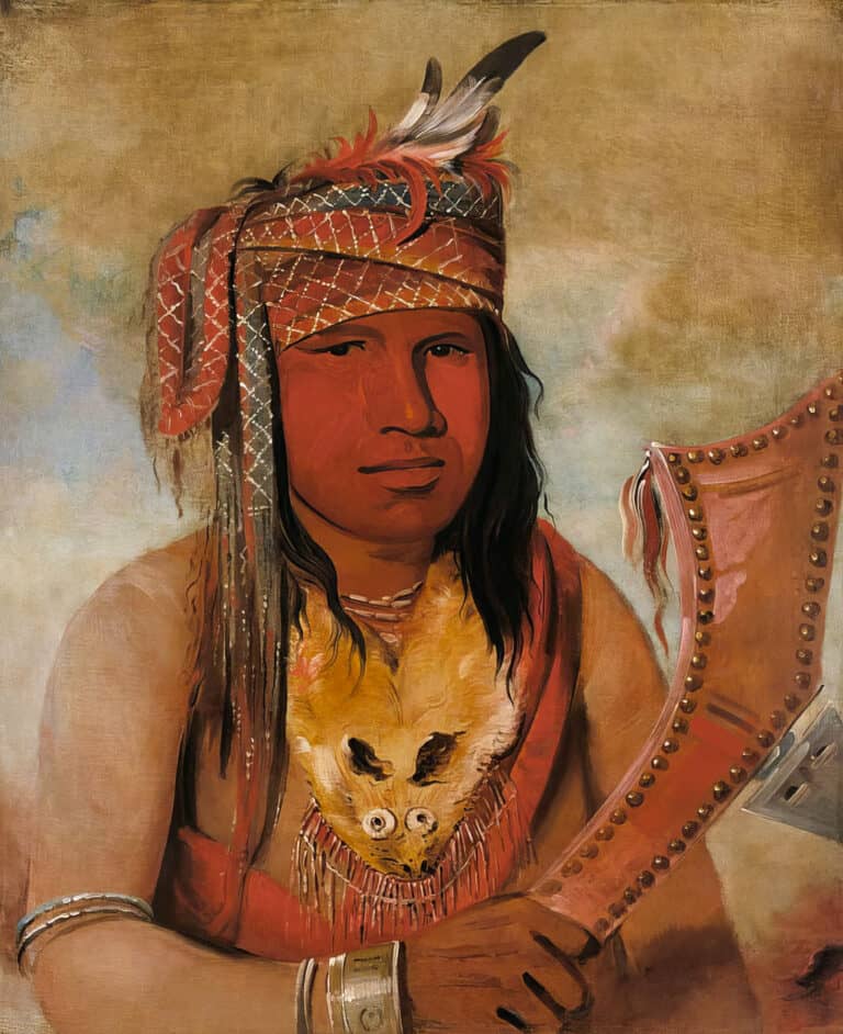 I-an-be-w'ah-dic, Jelen Karibu, odžibwejský válečník na portrétu G. Catlina z roku 1836, má kolem hlavy omotanou sash jako turban, jak bylo hojně rozšířeným zvykem v oblasti Velkých jezer a východních prérií.