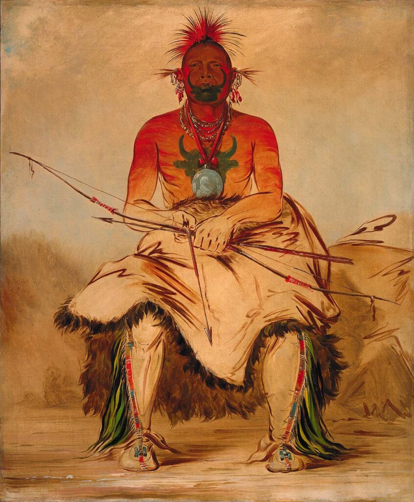 Bizoní býk, náčelník Pónyů na dobové malbě George Catlina. Jeho tělo je pomalované barevnými pigmenty smísenými s tukem, bohužel nelze říci, zda jde o pigmenty indiánského nebo komerčního původu. Malování těla barevnými pigmenty bylo pro indiány naprosto běžné.