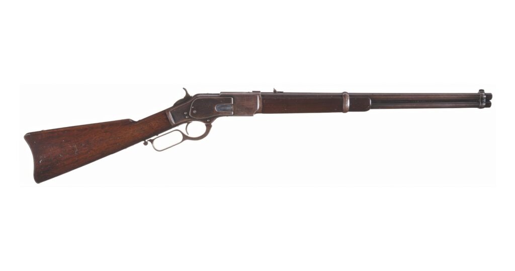 Winchester 1873 varianta karabina. Oproti staršímu modelu 1866 měla tato puška silnější náboj 44-40 a plášť závěru již nebyl z bronzu ale ze železa nebo oceli. Také přibyl odsouvací kryt vyhazovacího otvoru.