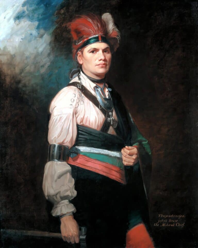 Joseph Brandt – Thayendanegea na portrétu britského mistra George Romneyho má na sobě celou řadu stříbrných ozdob: gorget, nápažník, kruhové brože, závěsy apod.
